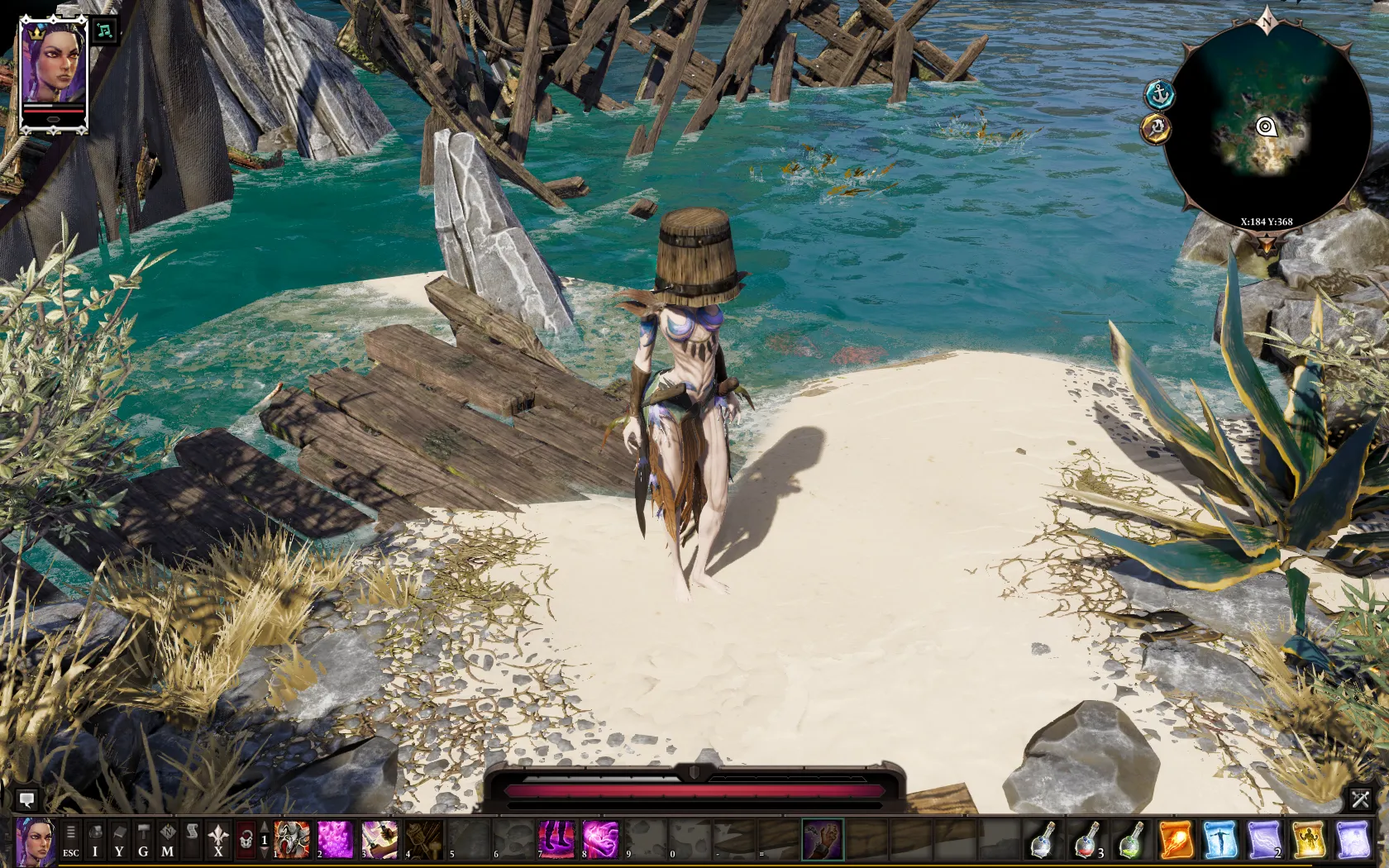 An elf stands on a beach with a bucket on her head